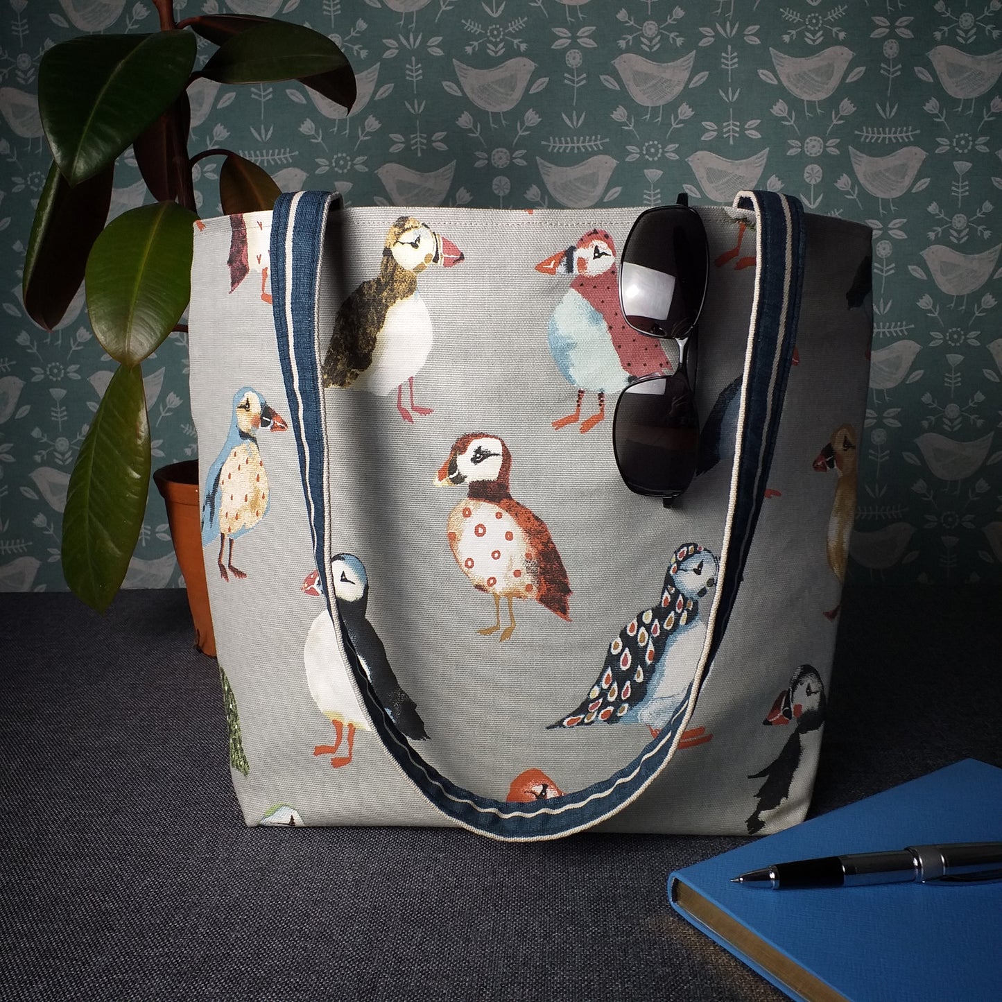 Large tote bag with multi-colour puffins design on grey background