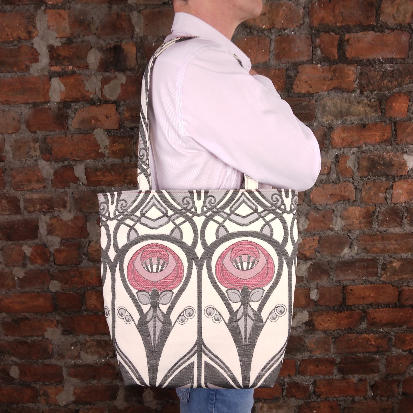 Large tote bag with stylised red roses with black art deco design on cream colour background