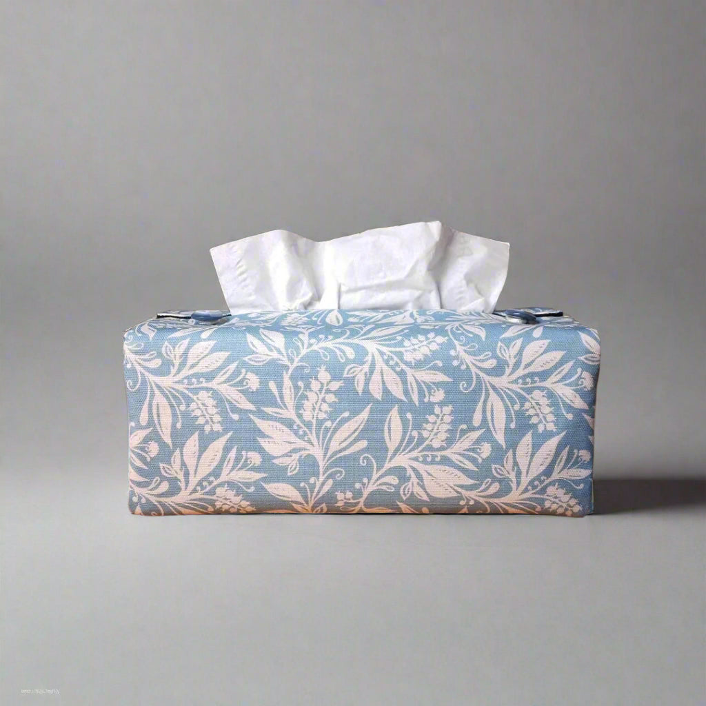 Rectangle tissue box cover with white wildflower design on light blue background