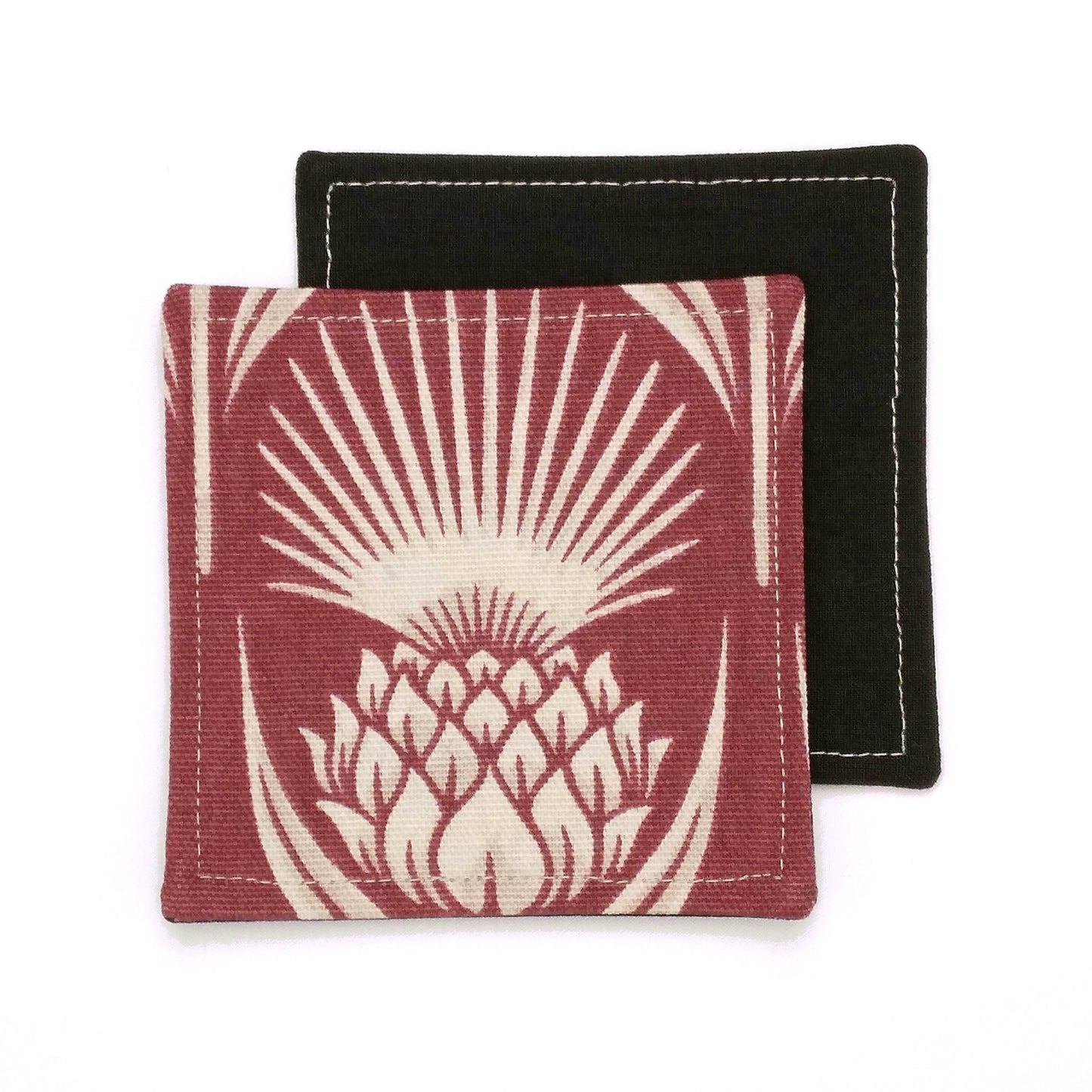 Square coasters with ivory thistle pattern on garnet colour background