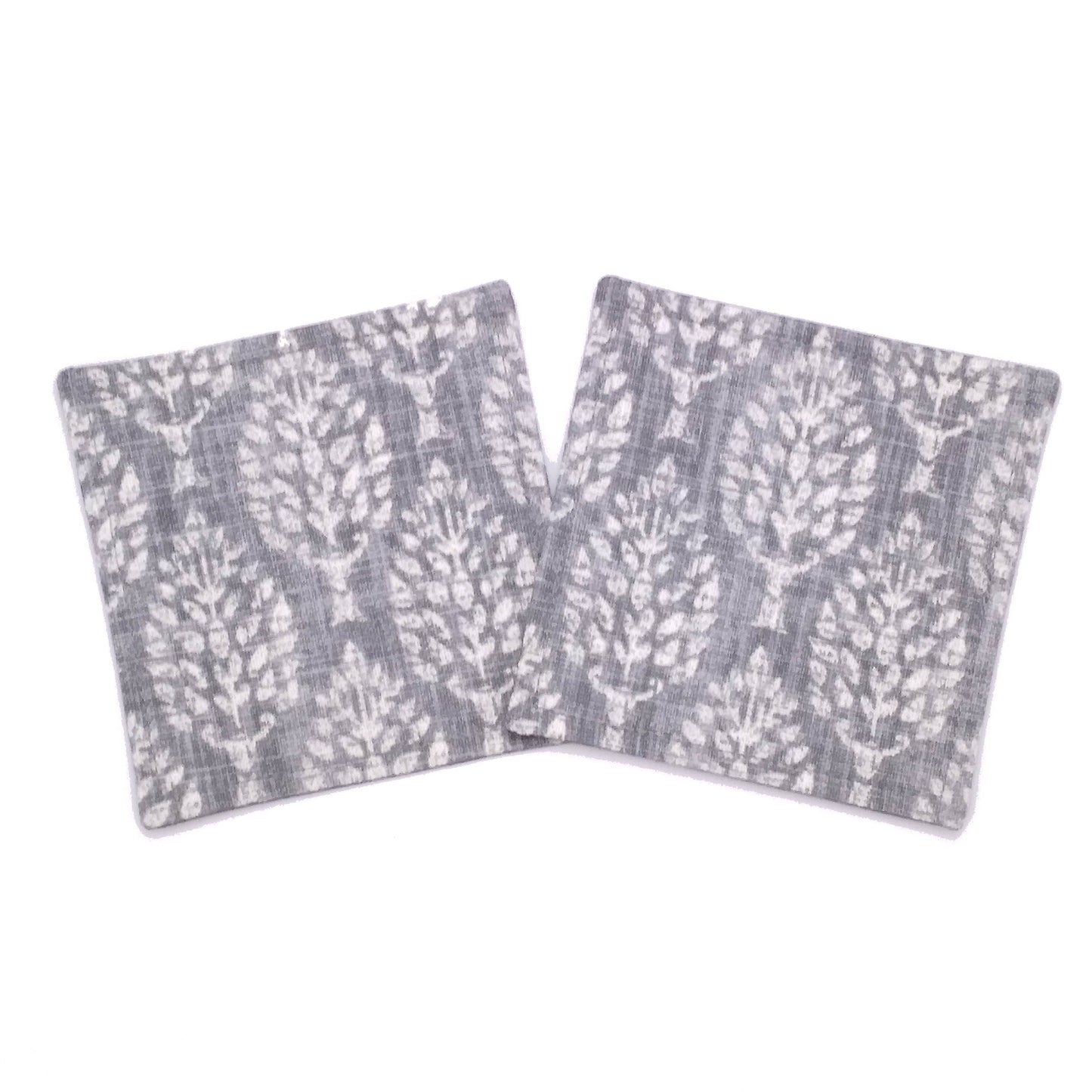 Square coasters with off white poplar trees design on grey background