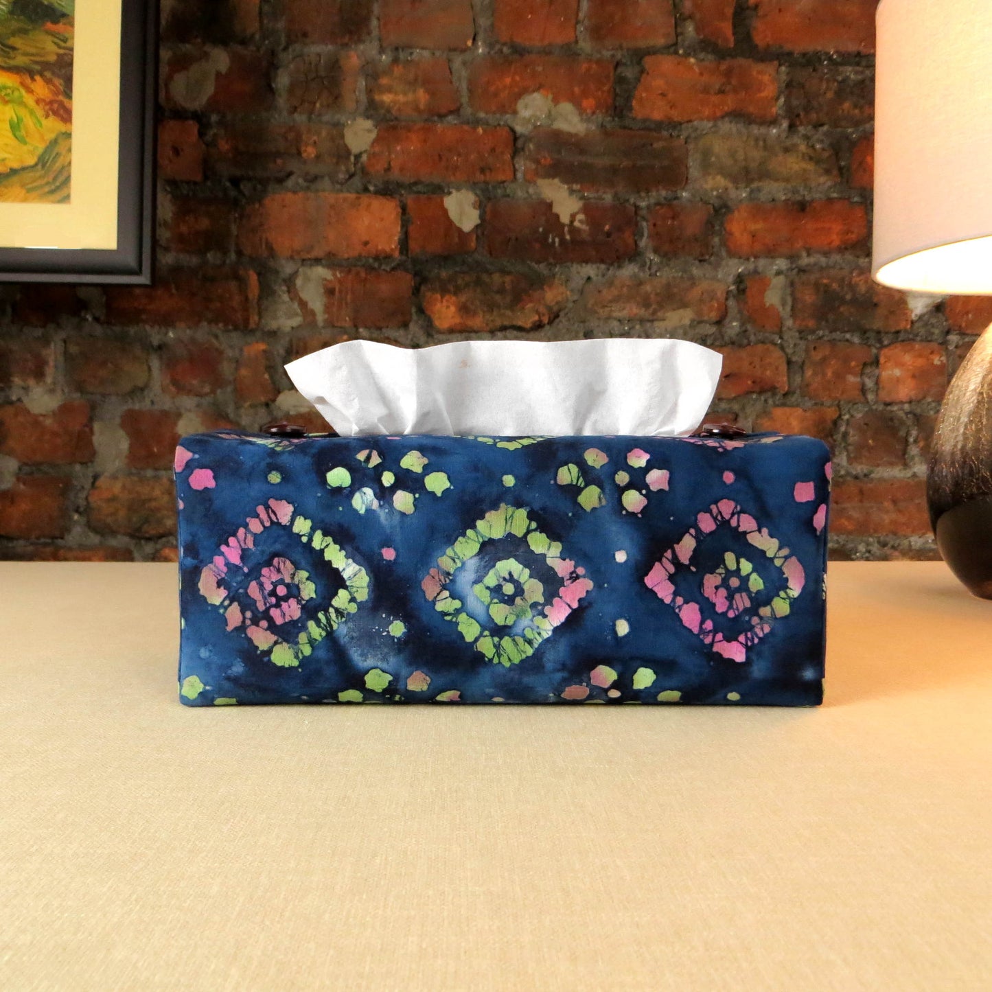 Batik printed cotton rectangle tissue box cover with tie dye magenta and green diamond design on blue background