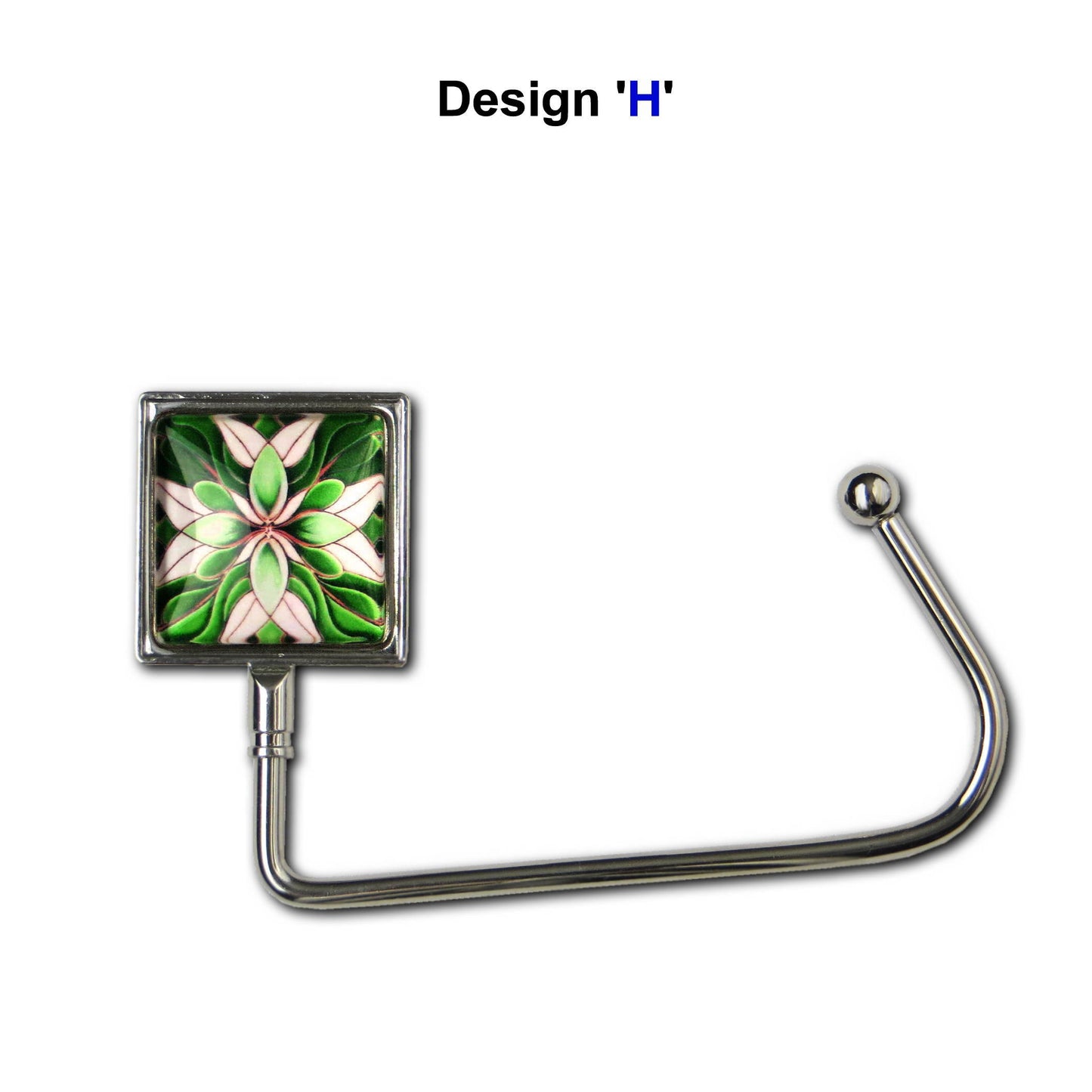 Handbag hook with glass domed image for hanging accessories on tables, ledges, and shelves