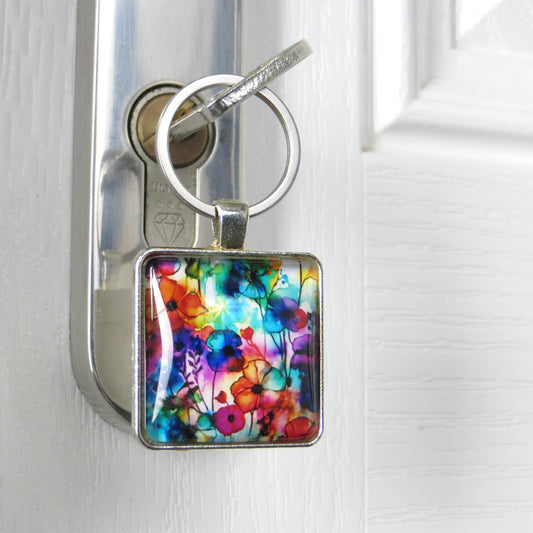 Keyring with a colourful glass domed image