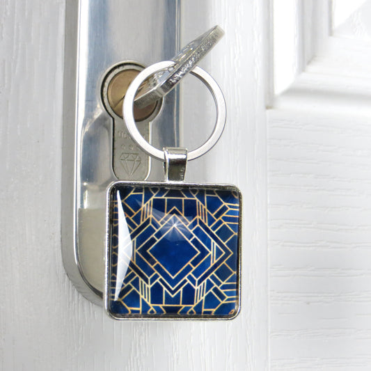 Keyring with a colourful glass domed image