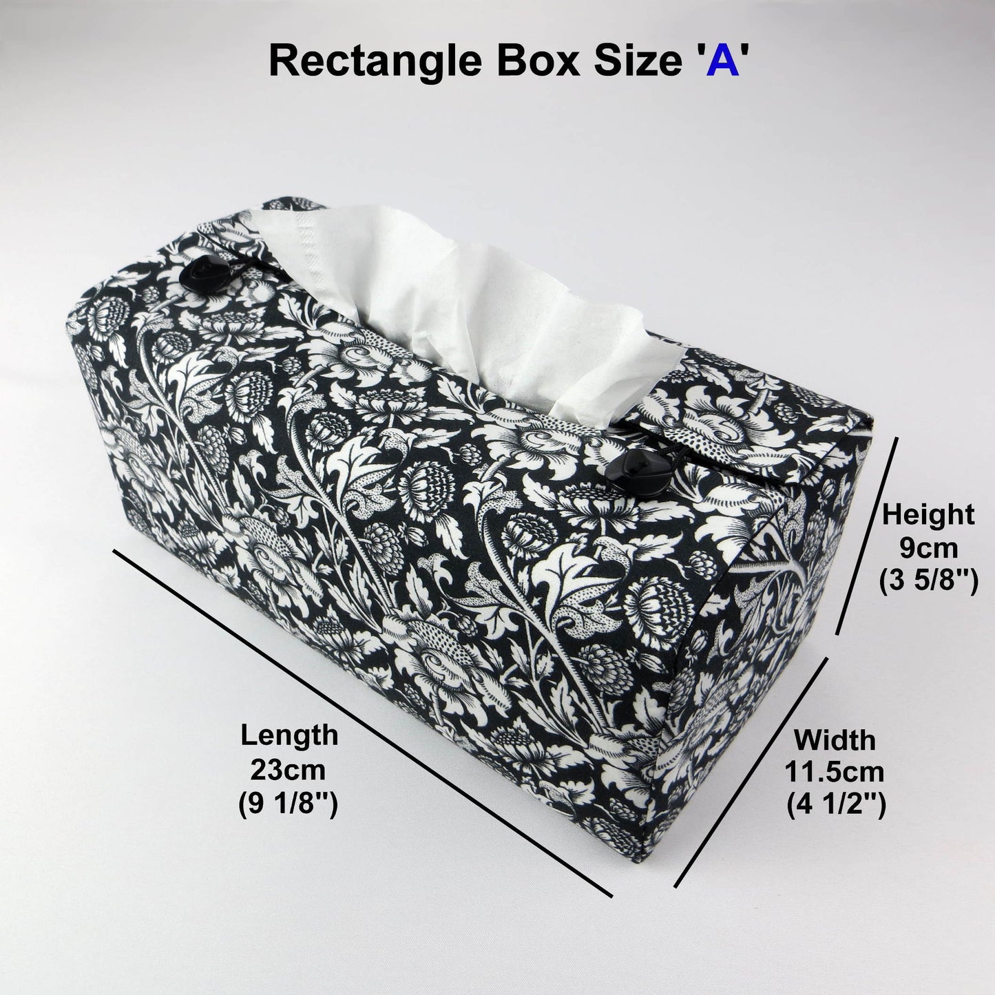 Rectangle tissue box cover with white flowering vine design on black background
