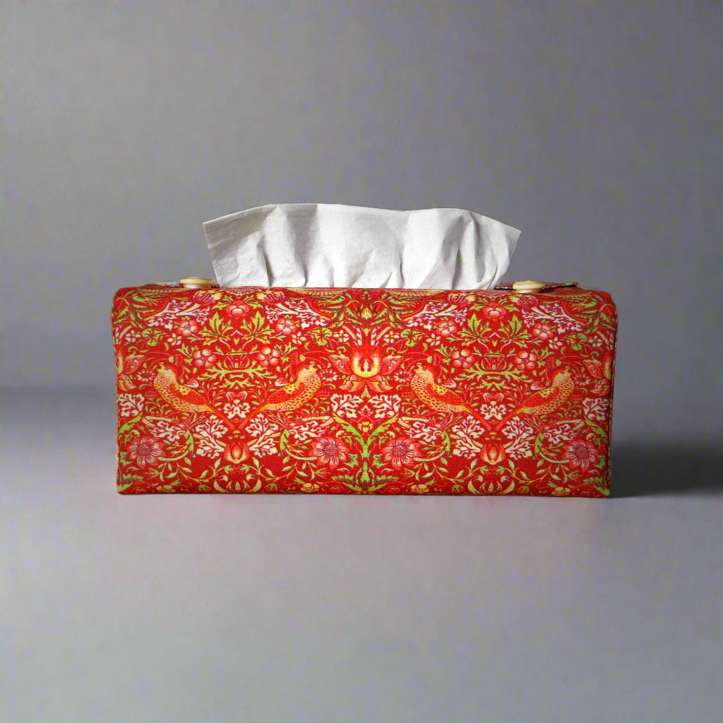 Rectangle tissue box cover with birds and berries design on red background