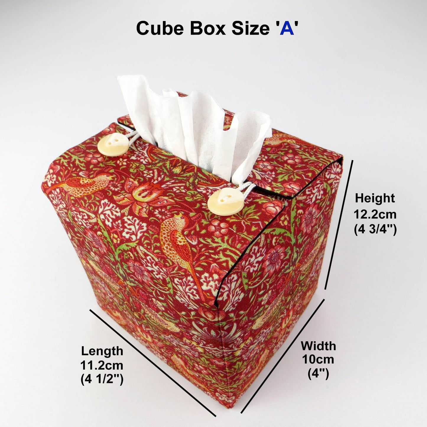 Square tissue box cover with birds and berries design on red background