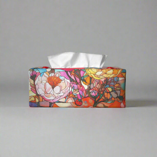 Rectangular tissue box cover with floral garden stained glass design on red toned background