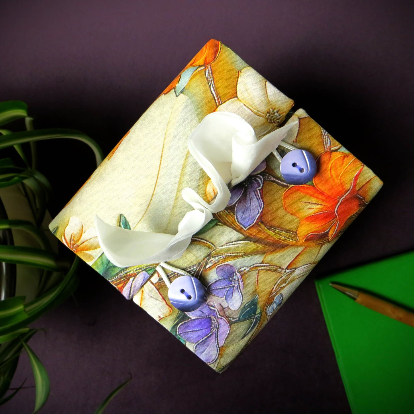 Square tissue box cover with a multi-colour floral design fabric