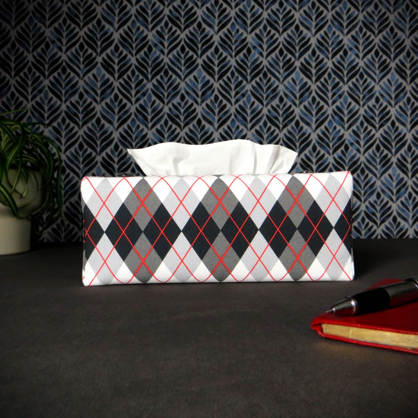 Rectangular tissue box cover with black, grey, and red argyle pattern