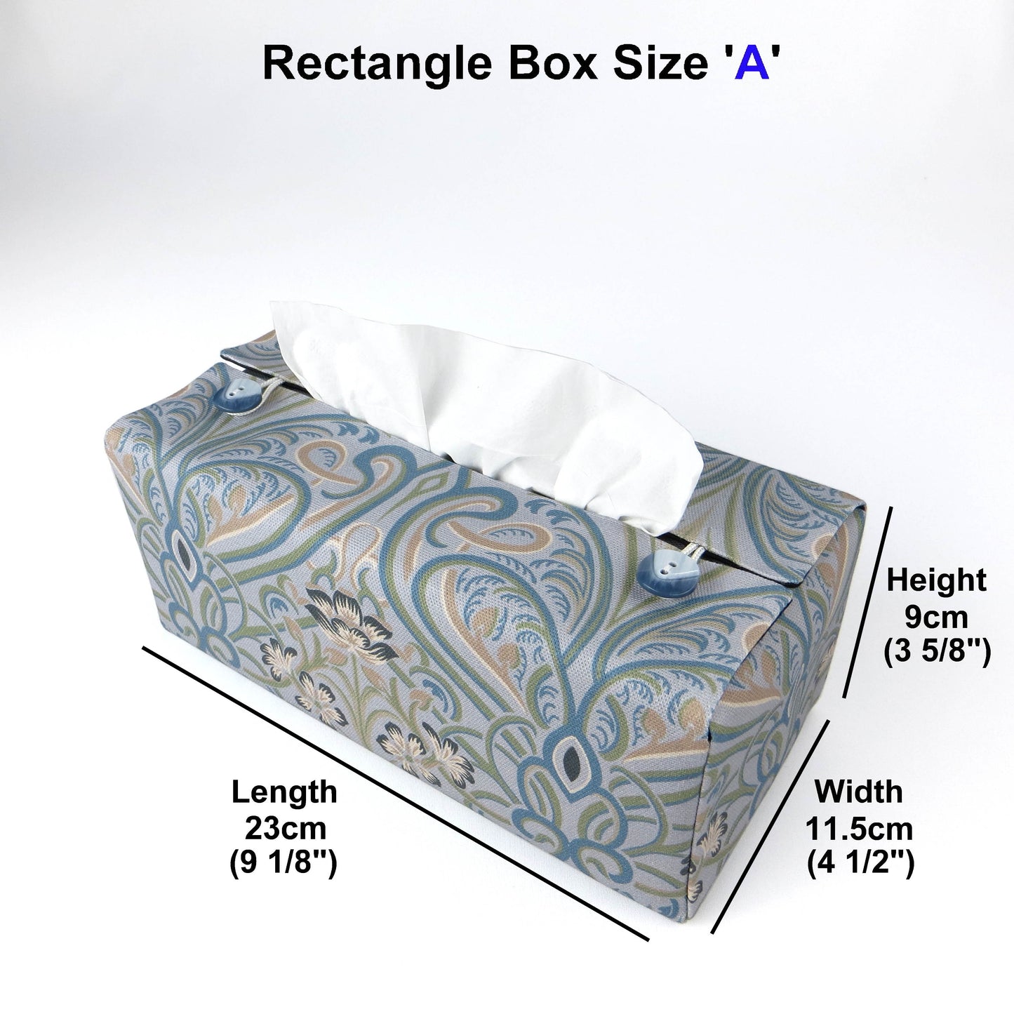 Rectangular tissue box cover with charcoal grey and white flowers with blue, green and taupe Victorian embellishment on blue-grey background
