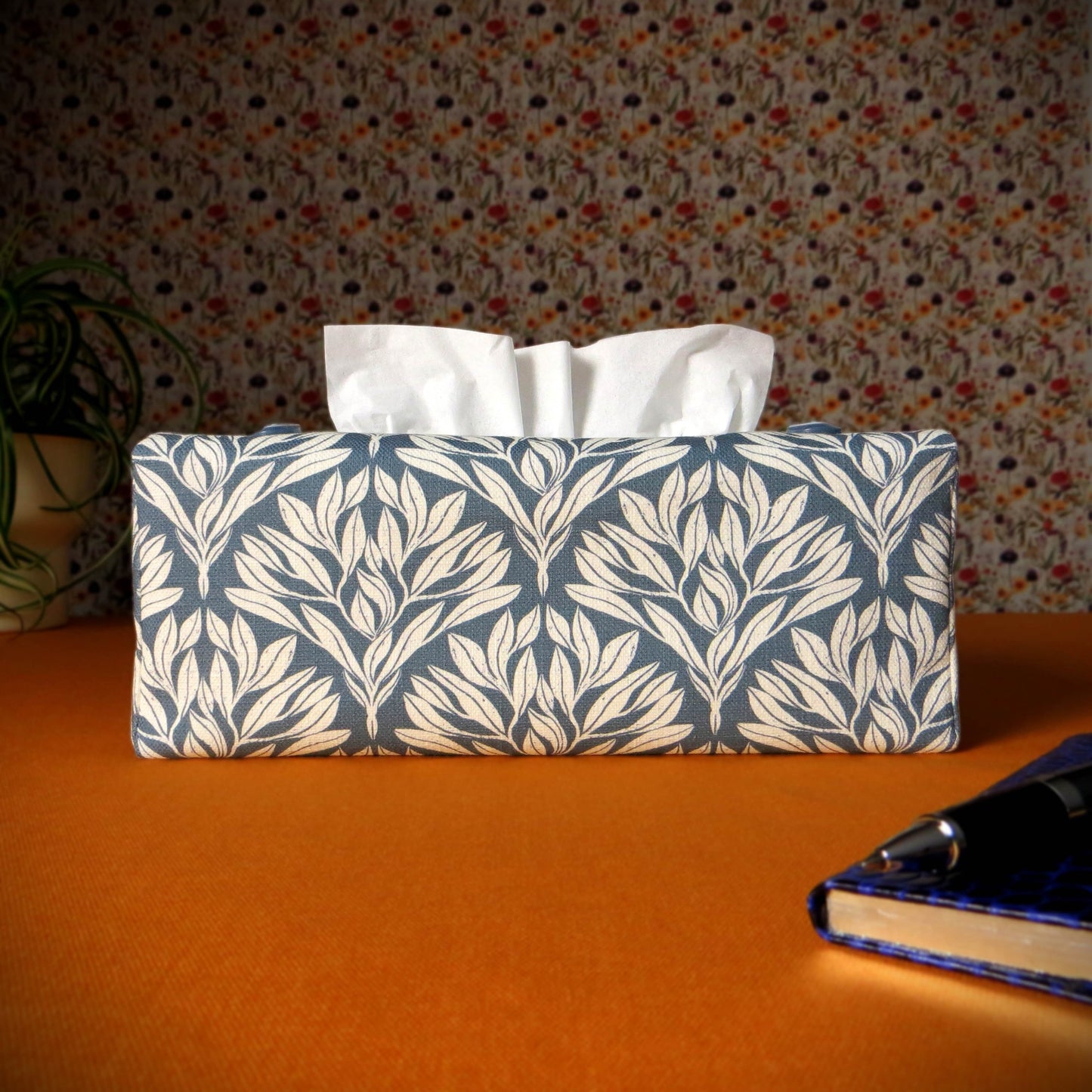 Linen rectangular tissue box cover with an off-white leaf pattern on a blue background