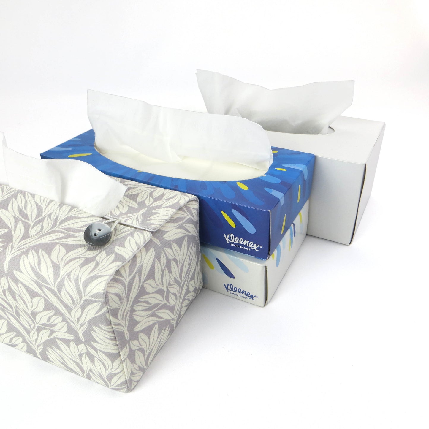 Linen rectangular tissue box cover with an off-white leaf pattern on a grey background