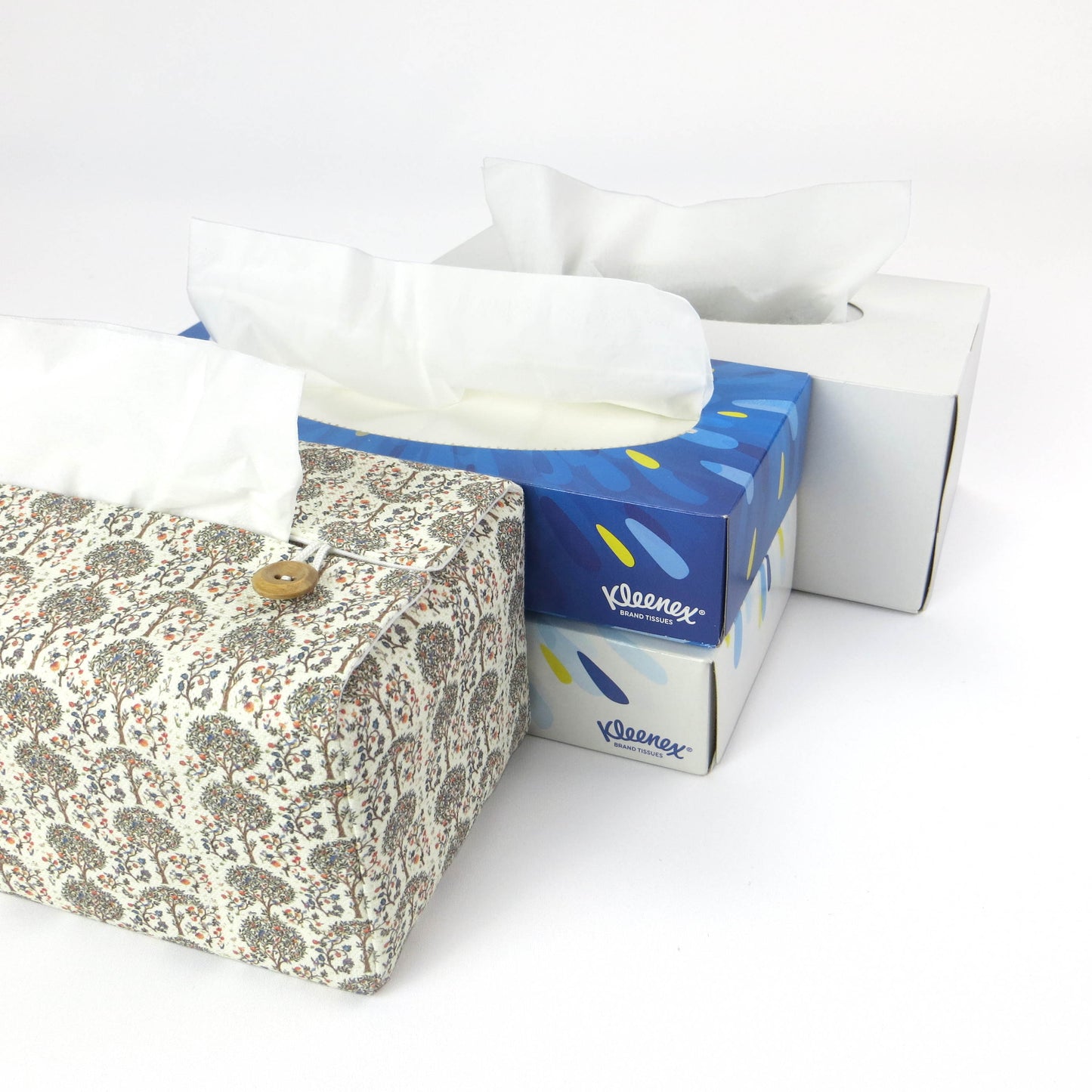 Linen rectangle tissue box cover with  a mini orchard grove pattern