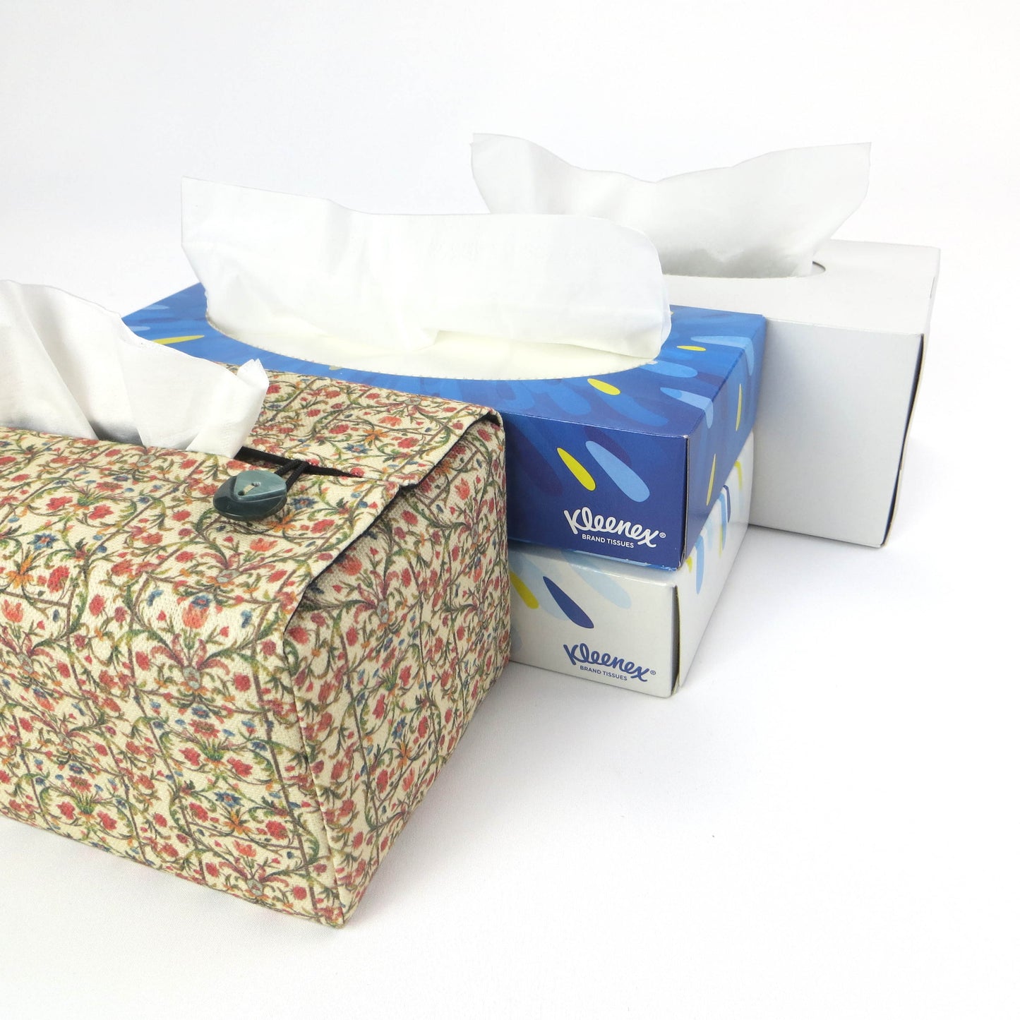 Linen rectangle tissue box cover with green vines with red and blue blossoms