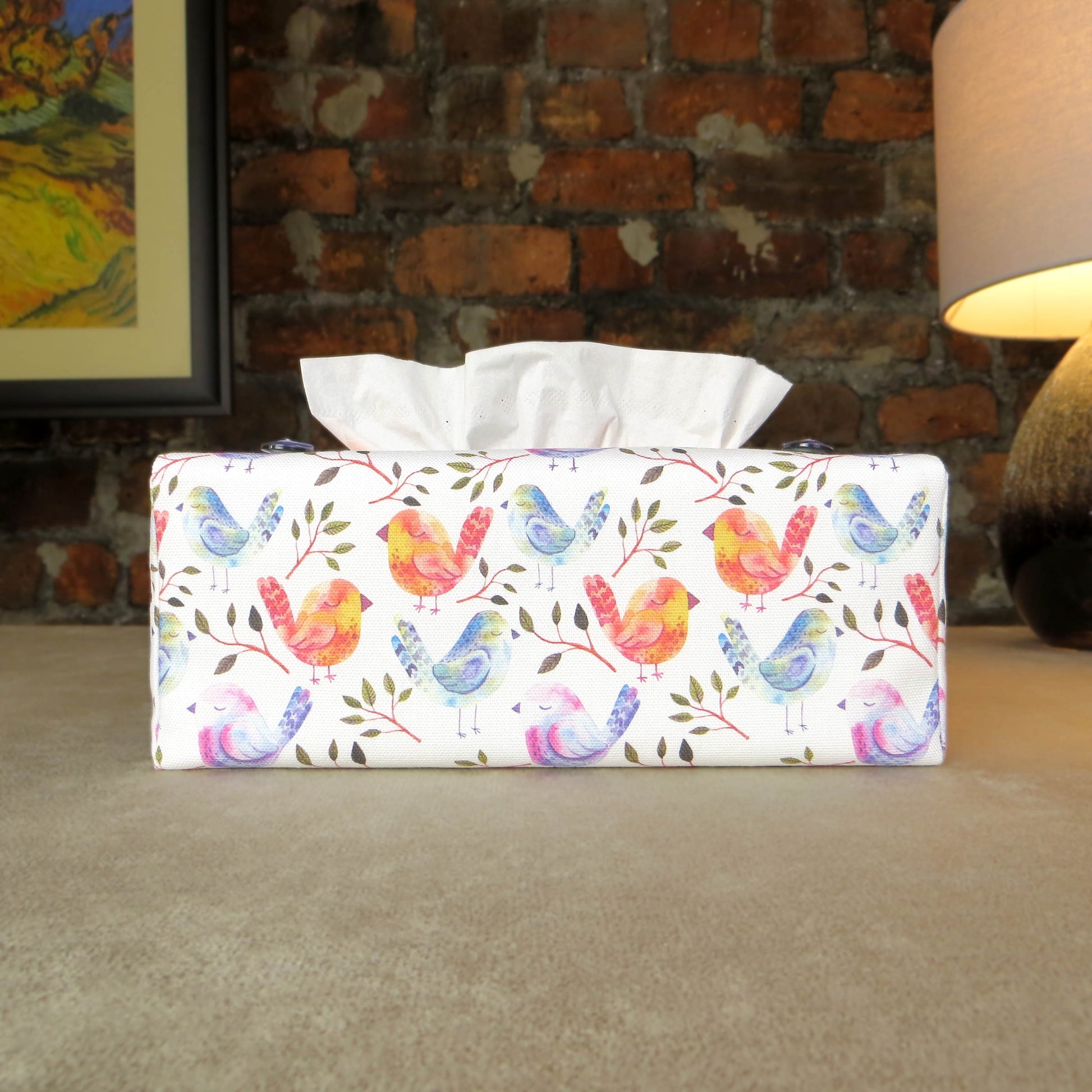 Cotton rectangle tissue box cover with watercolour style blue, purple, and orange sleeping birds on white background