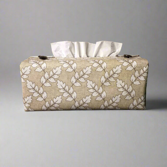 Printed cotton rectangle tissue box cover with off-white ash leaf pattern on oatmeal colour background