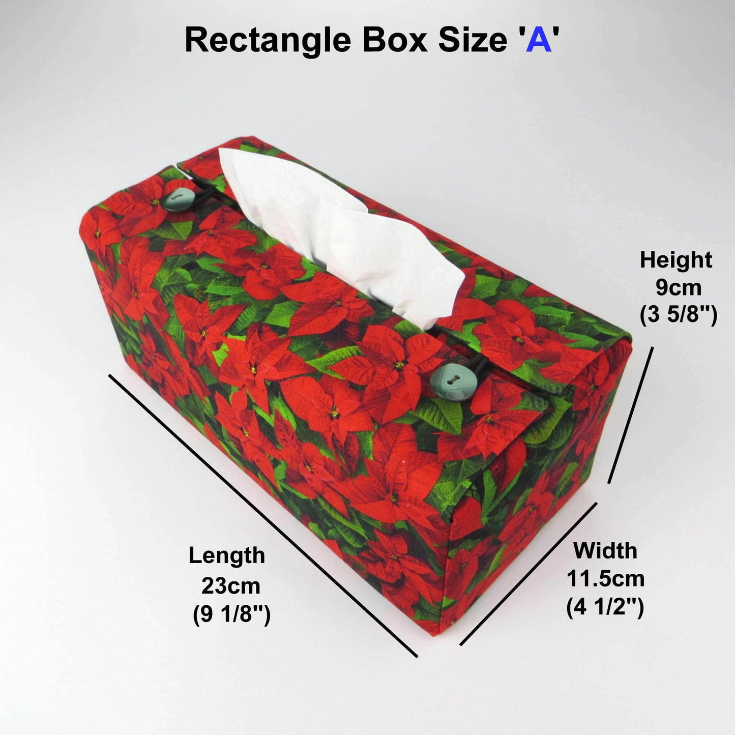 Rectangular tissue box cover with holiday themed poinsettia design on green leaf pattern background