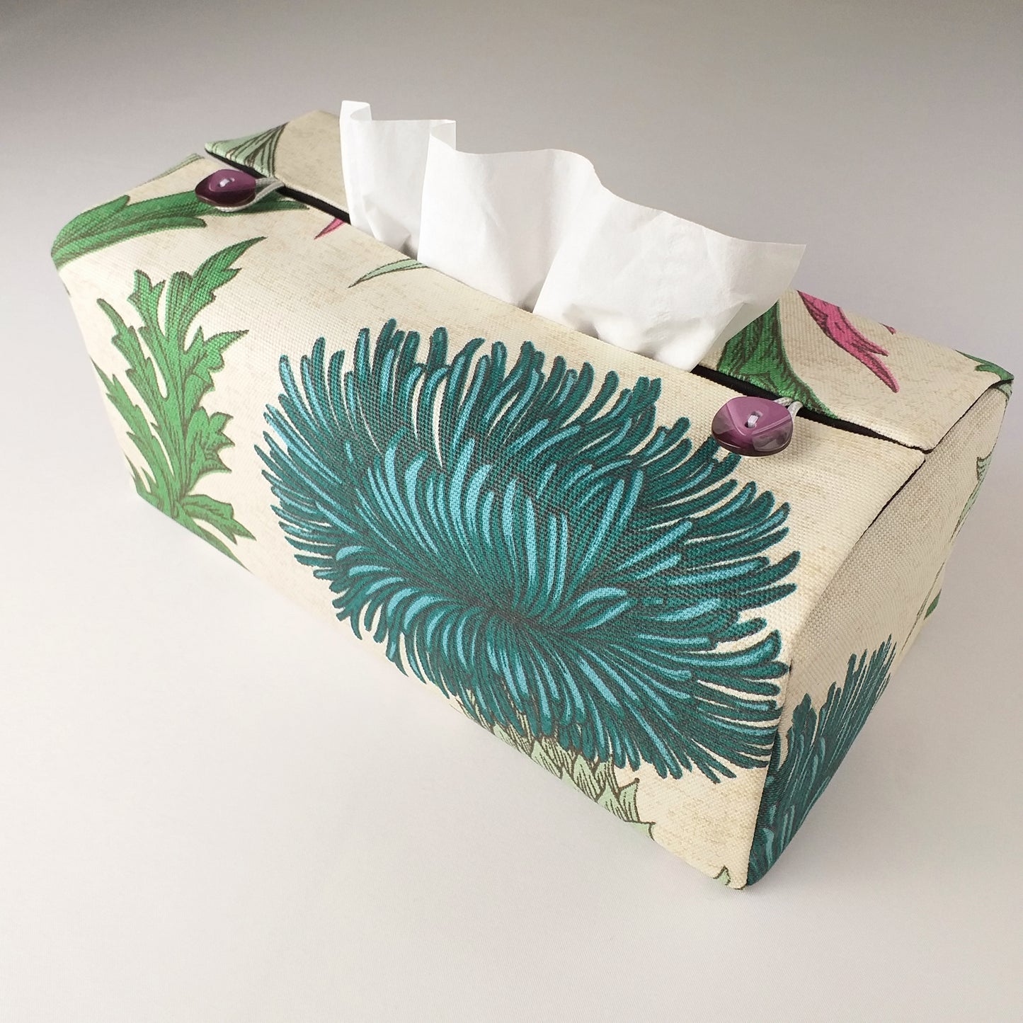 Rectangle tissue box cover with multi colour large botanical design on off-white background