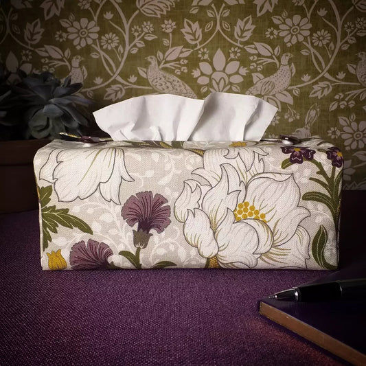 Rectangle tissue box cover with white magnolia flowers design with green, yellow, and purple accents