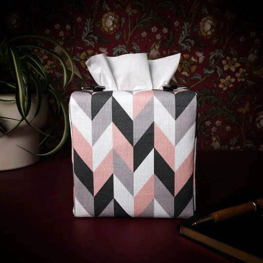 Square tissue box cover with pink, grey, white and black herringbone pattern