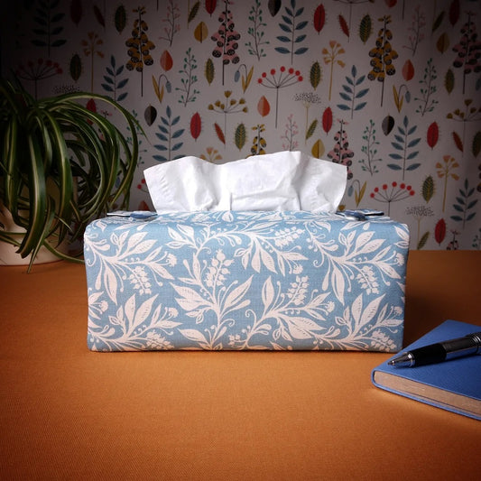 Rectangle tissue box cover with white wildflower design on light blue background