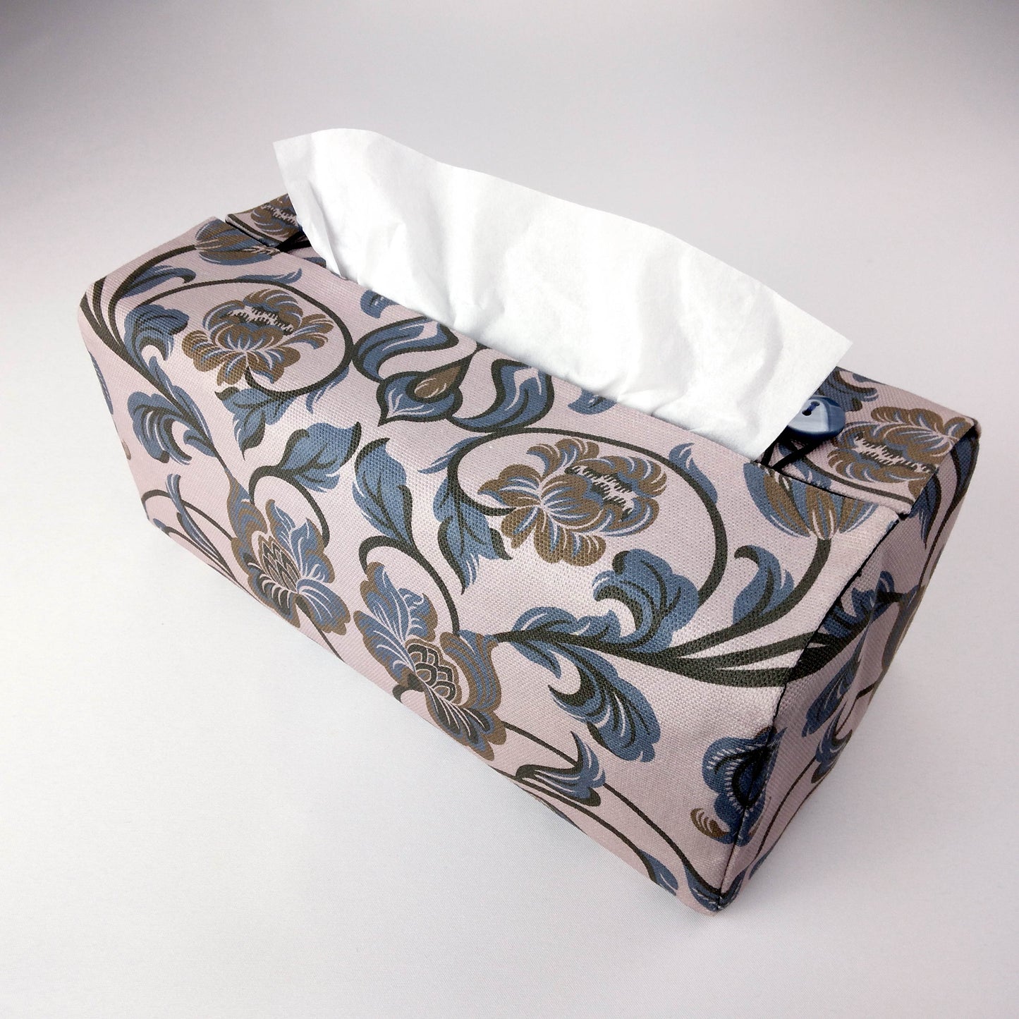 Printed cotton rectangle tissue box cover with grey and brown baroque style floral design on taupe background