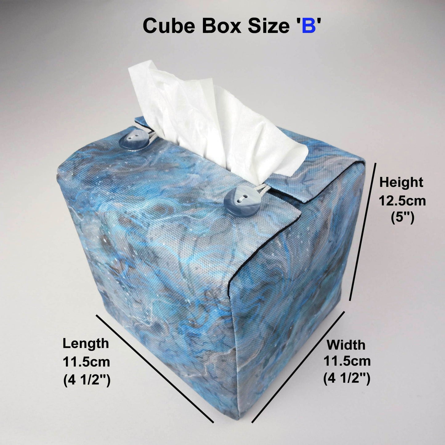 Square tissue box cover with light blue, grey, and white abstract pattern