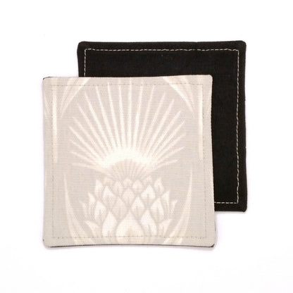 Square coasters with off-white thistle pattern on ivory colour background