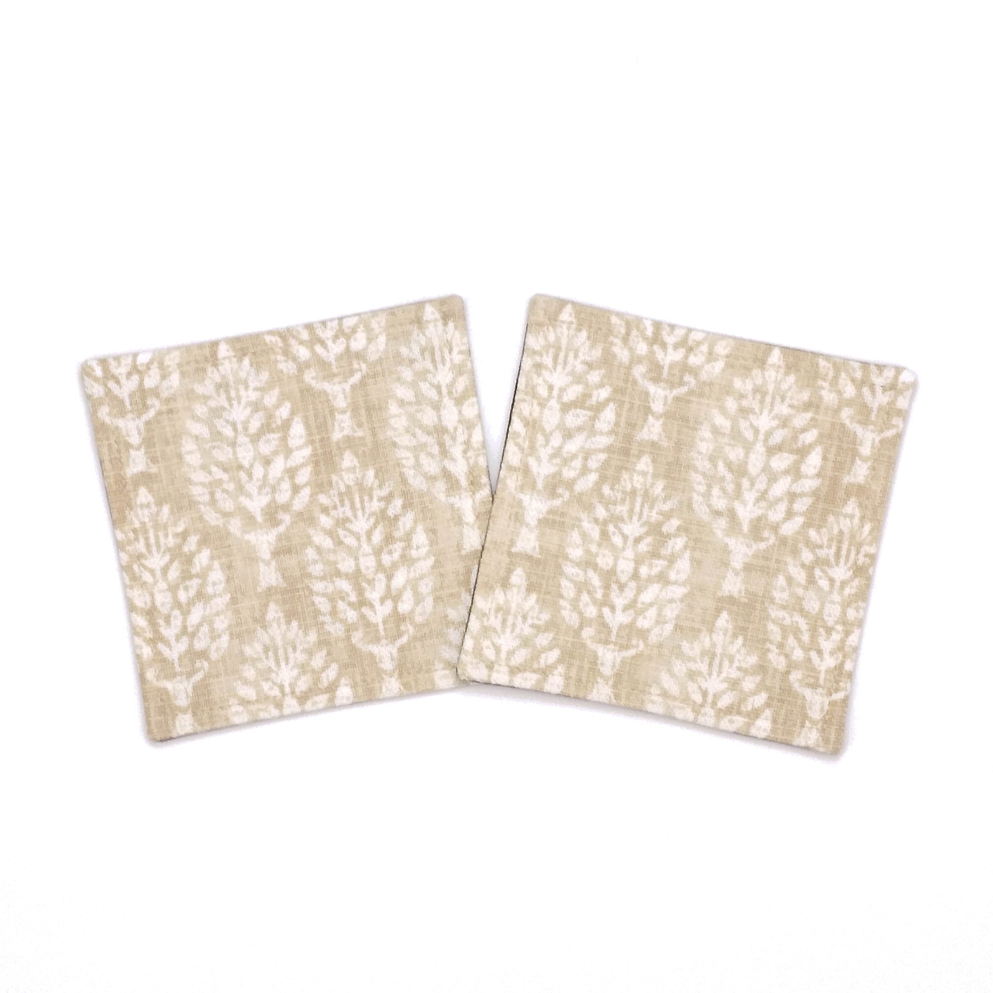 Square coasters with tan poplar trees design on wheat colour background