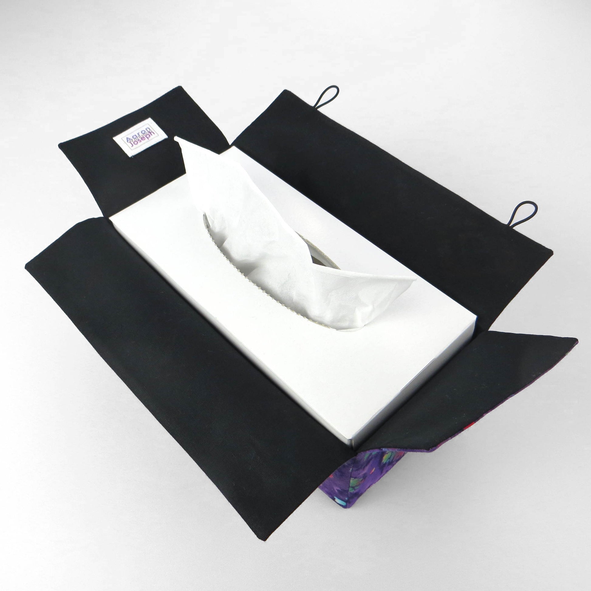 Batik printed cotton rectangle tissue box cover with tie dye multi colour diamond design on purple background