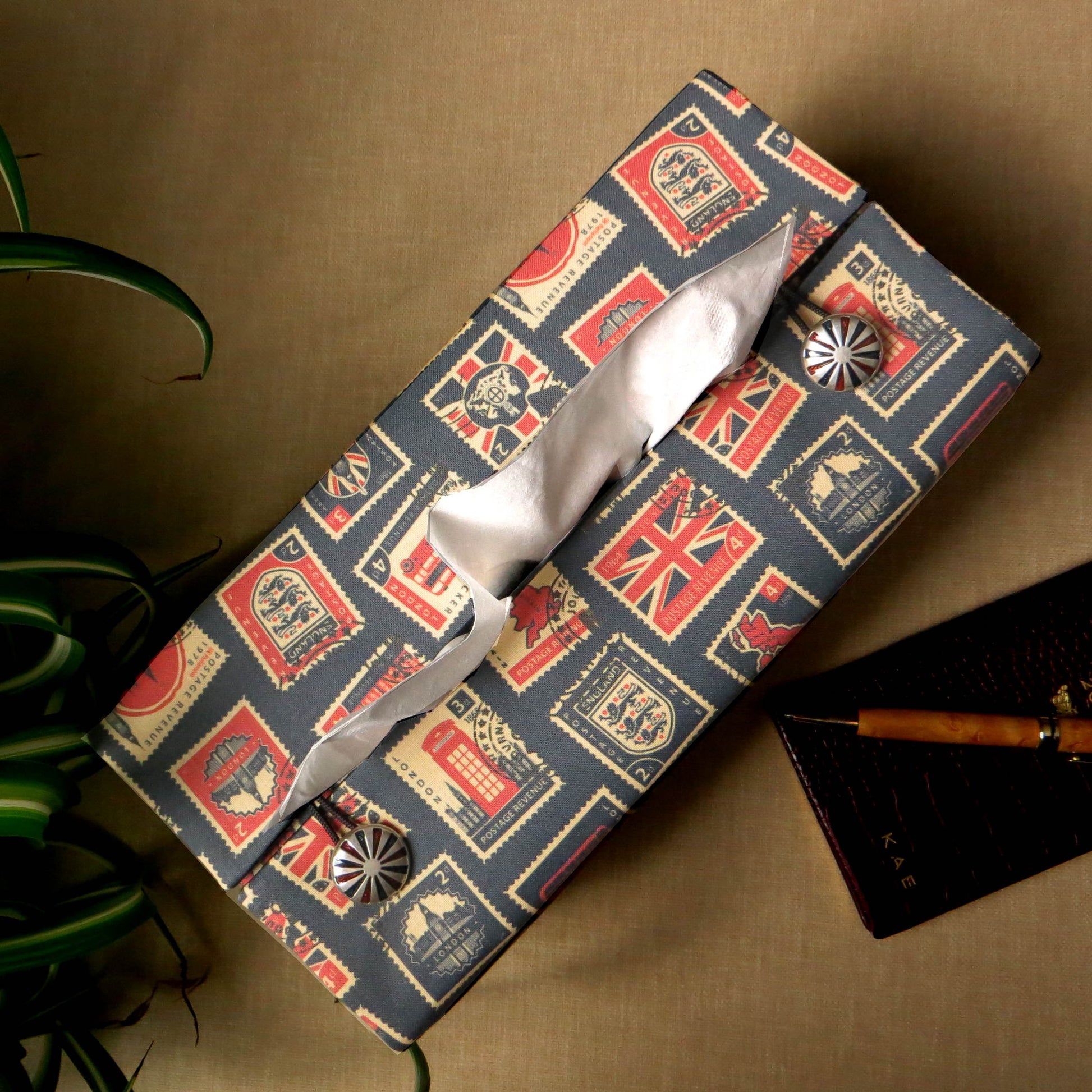 Printed cotton rectangle tissue box cover with British stamps design on pale navy background