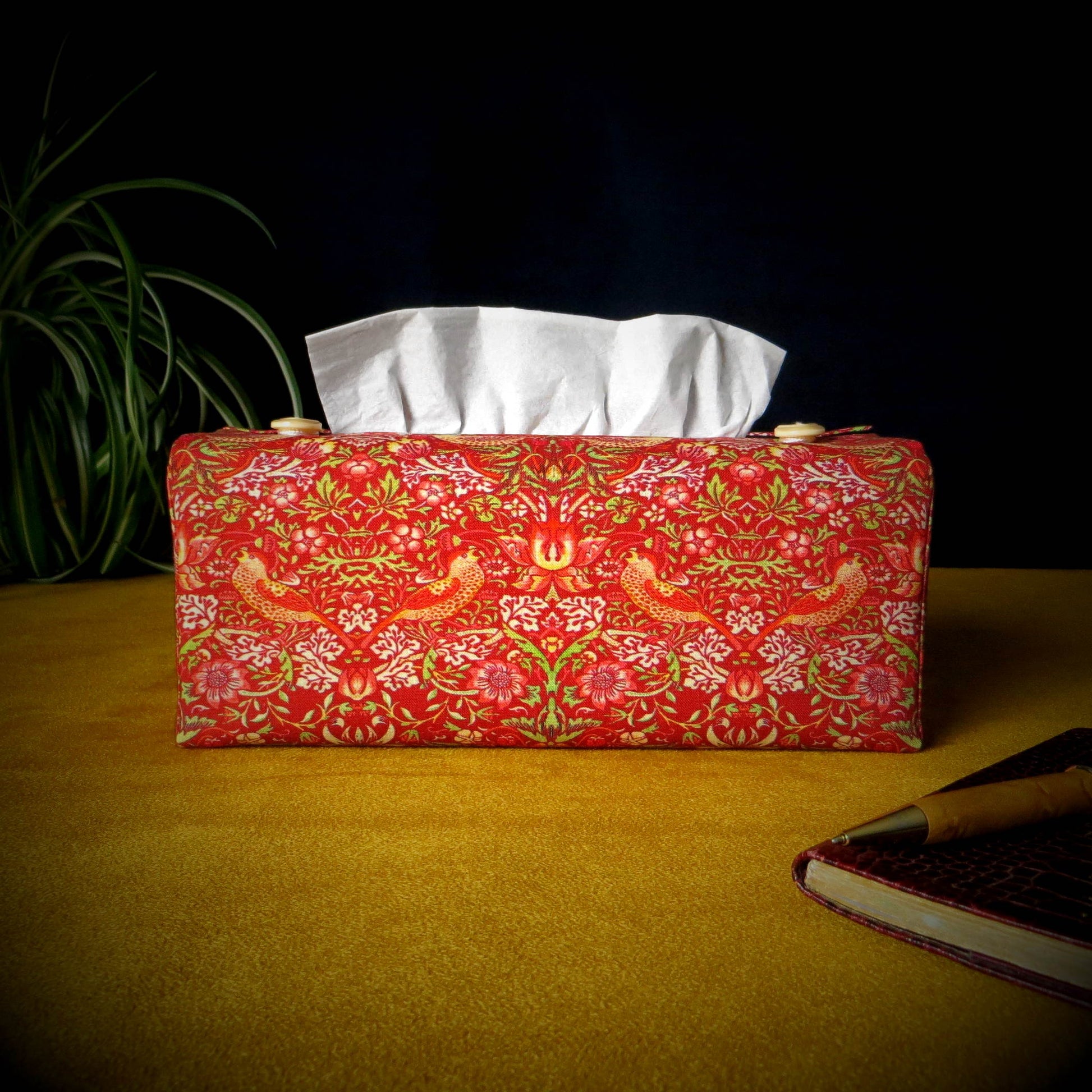 Rectangle tissue box cover with birds and berries design on red background