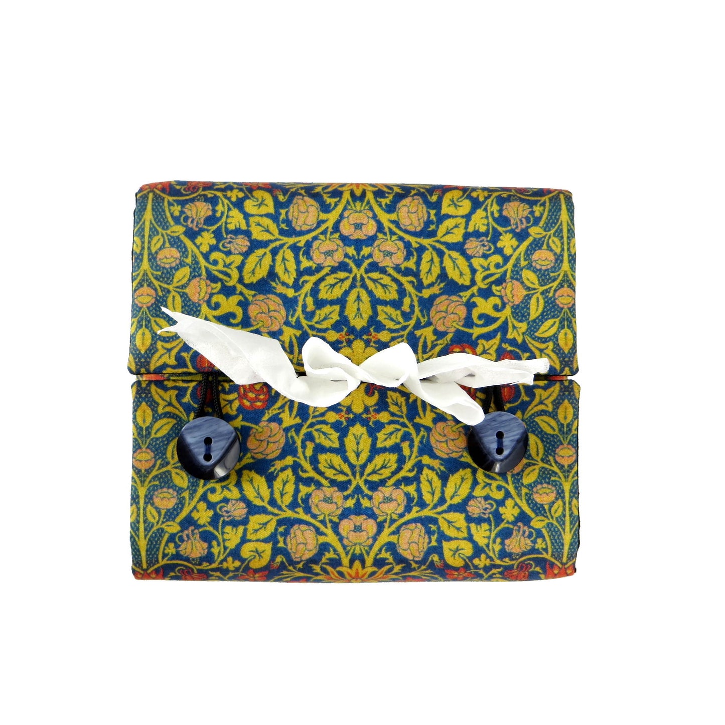 Cube tissue box cover with orange flowers and yellow vines design on blue background
