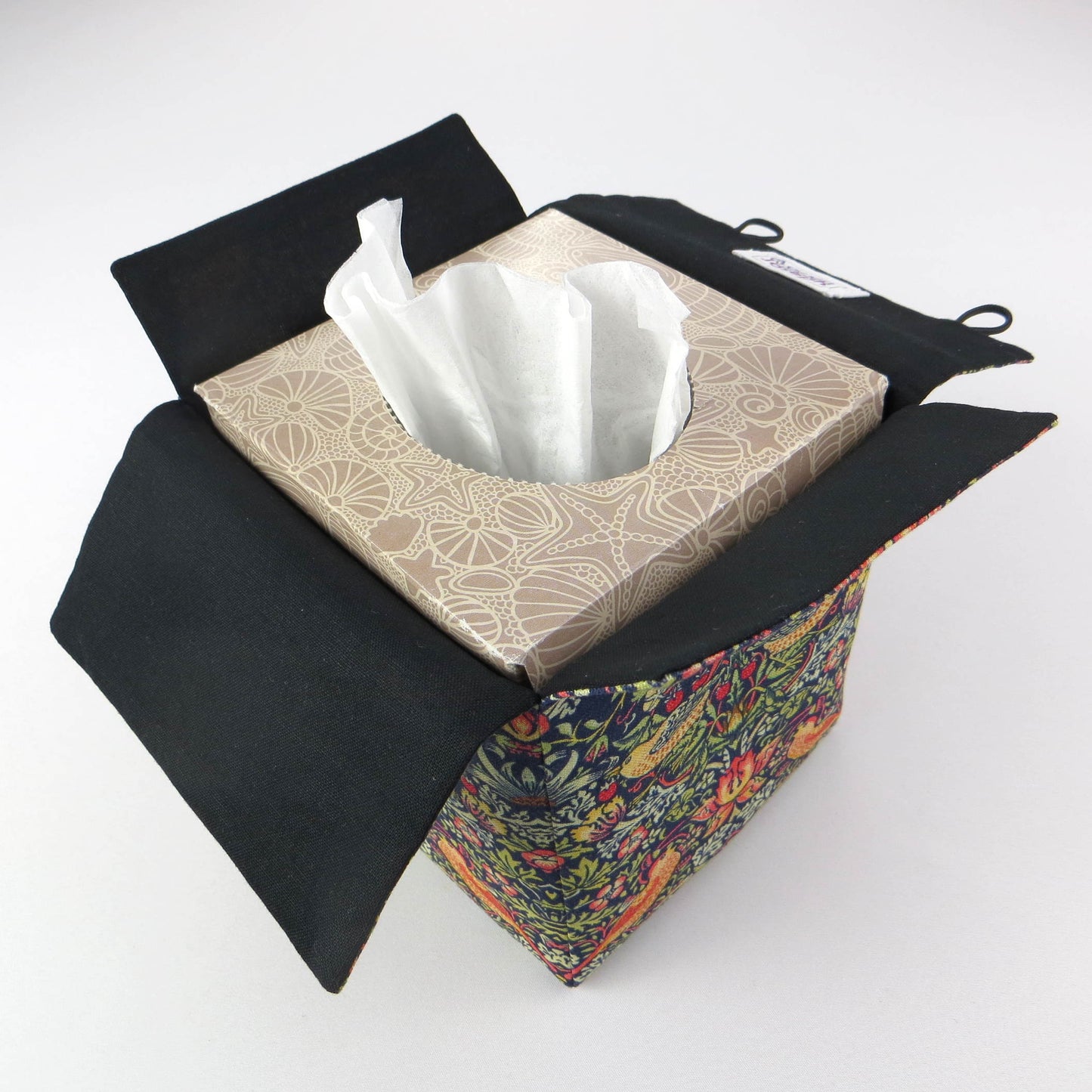 Square tissue box cover with birds and berries design on dark blue background