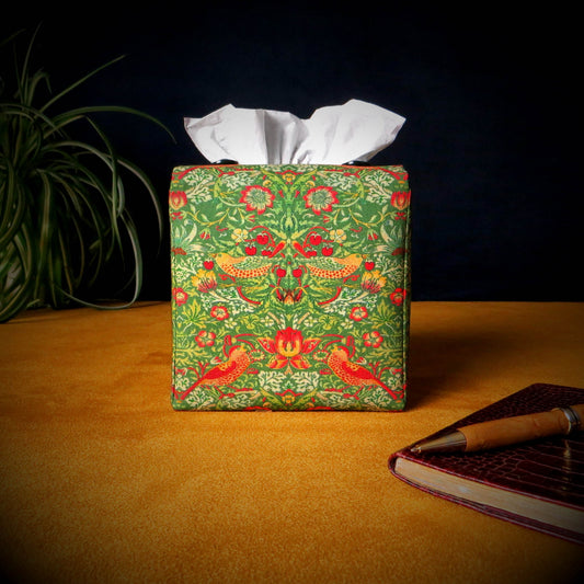 Square tissue box cover with birds and berries design on green background