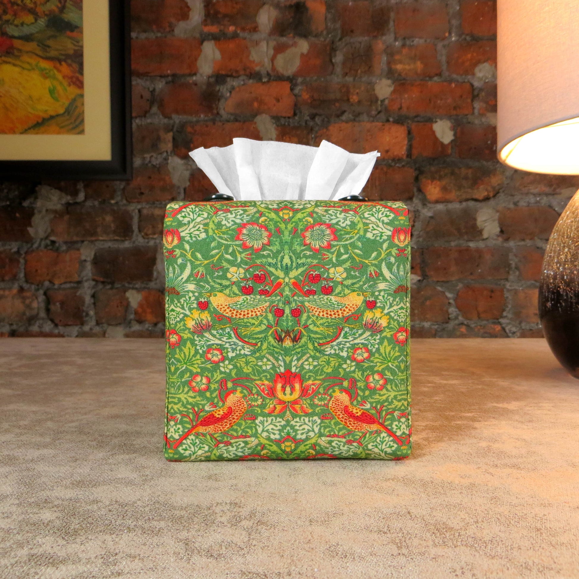 Square tissue box cover with birds and berries design on green background