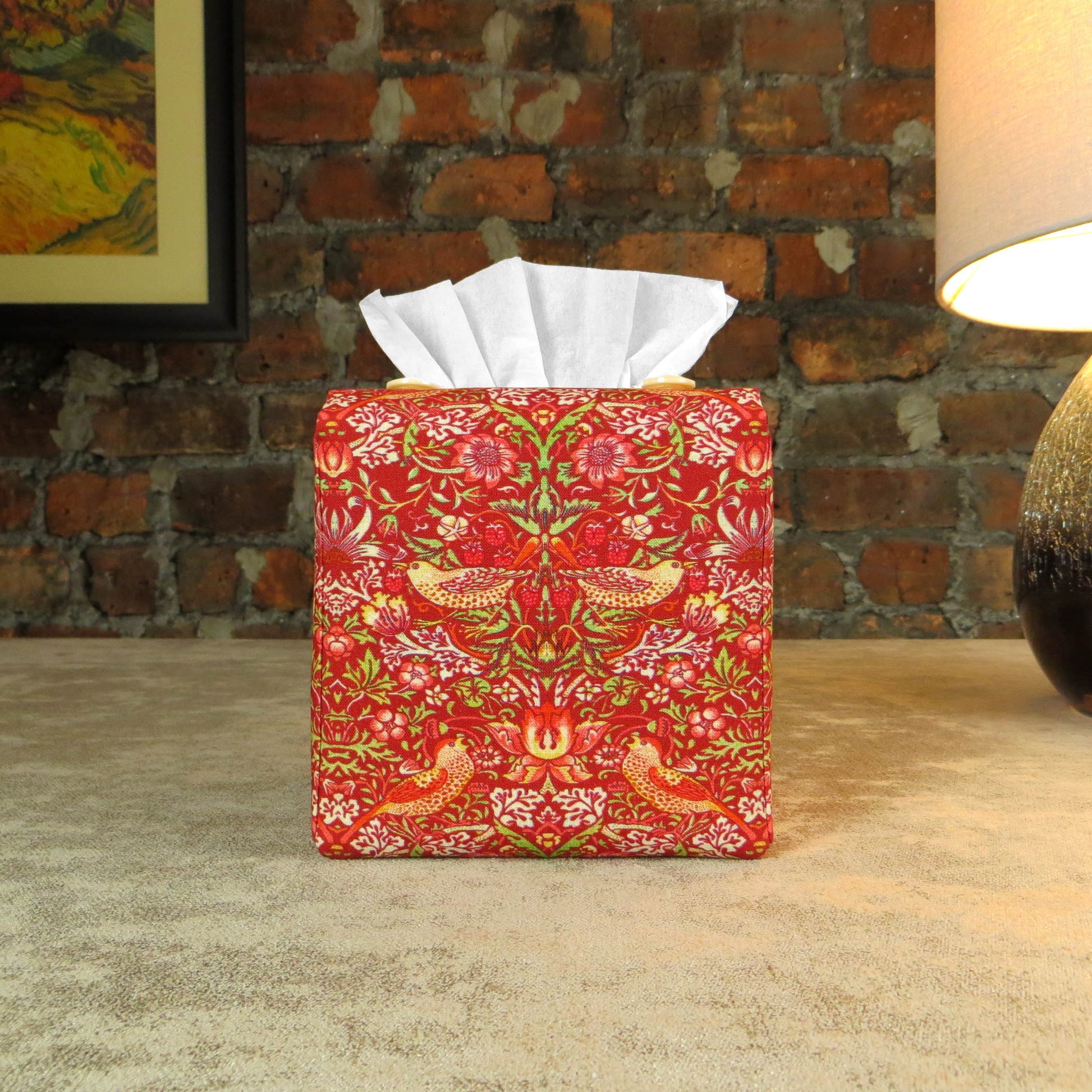 Square tissue box cover with birds and berries design on red background
