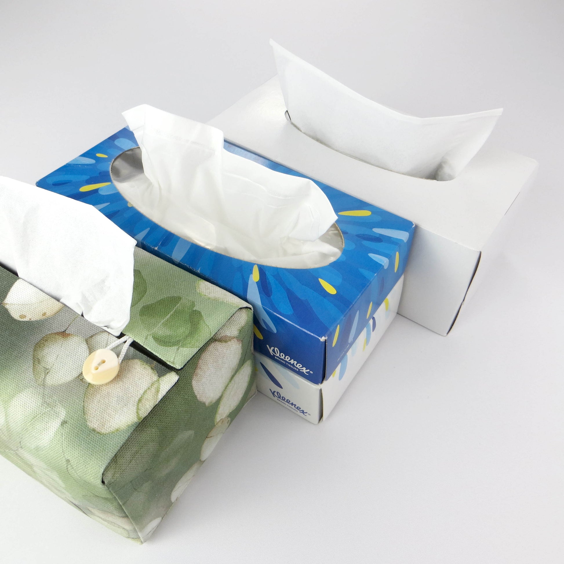 Printed cotton rectangle tissue box cover with lunaria leaf design on green background