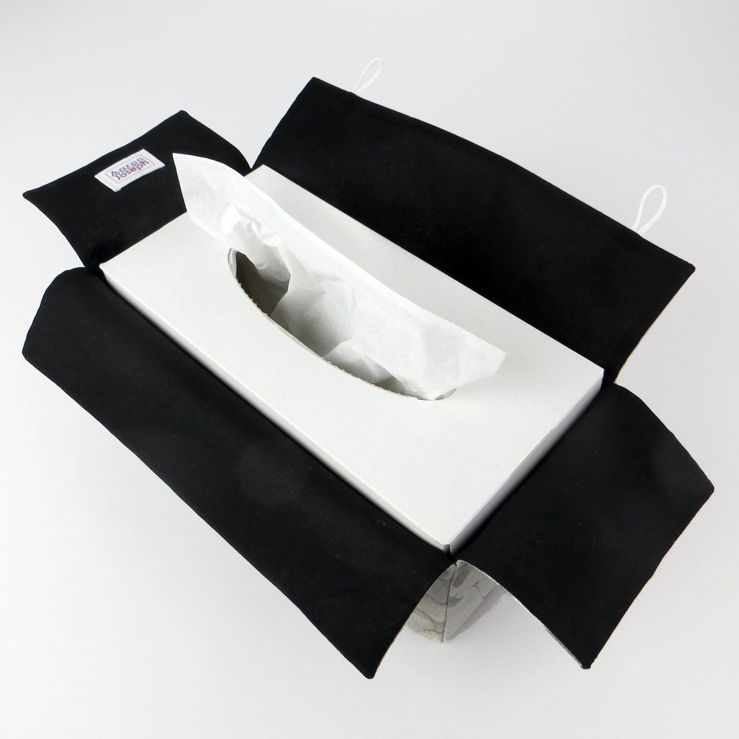 Printed cotton rectangle tissue box cover with lunaria leaf design on grey background