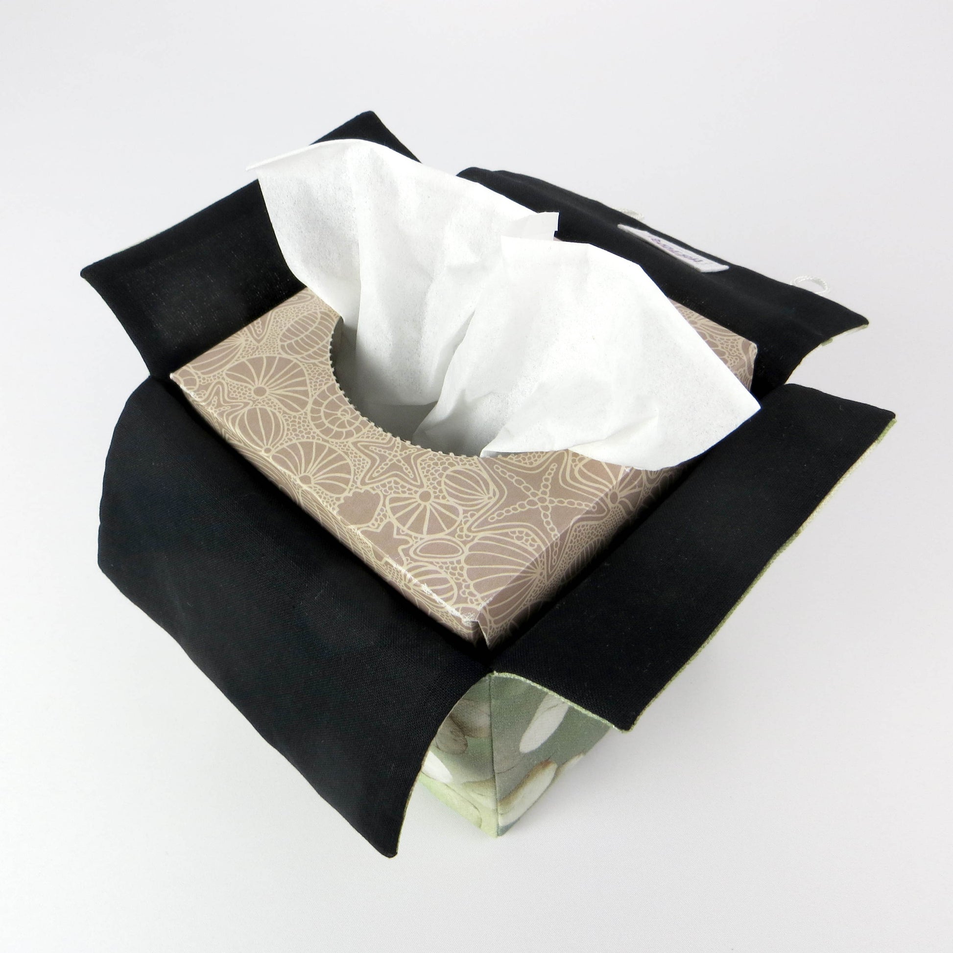 Printed cotton square tissue box with lunaria leaf design on green background