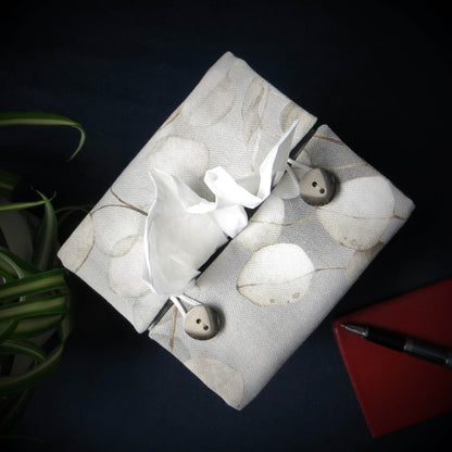 Printed cotton square tissue box with lunaria leaf design on grey background