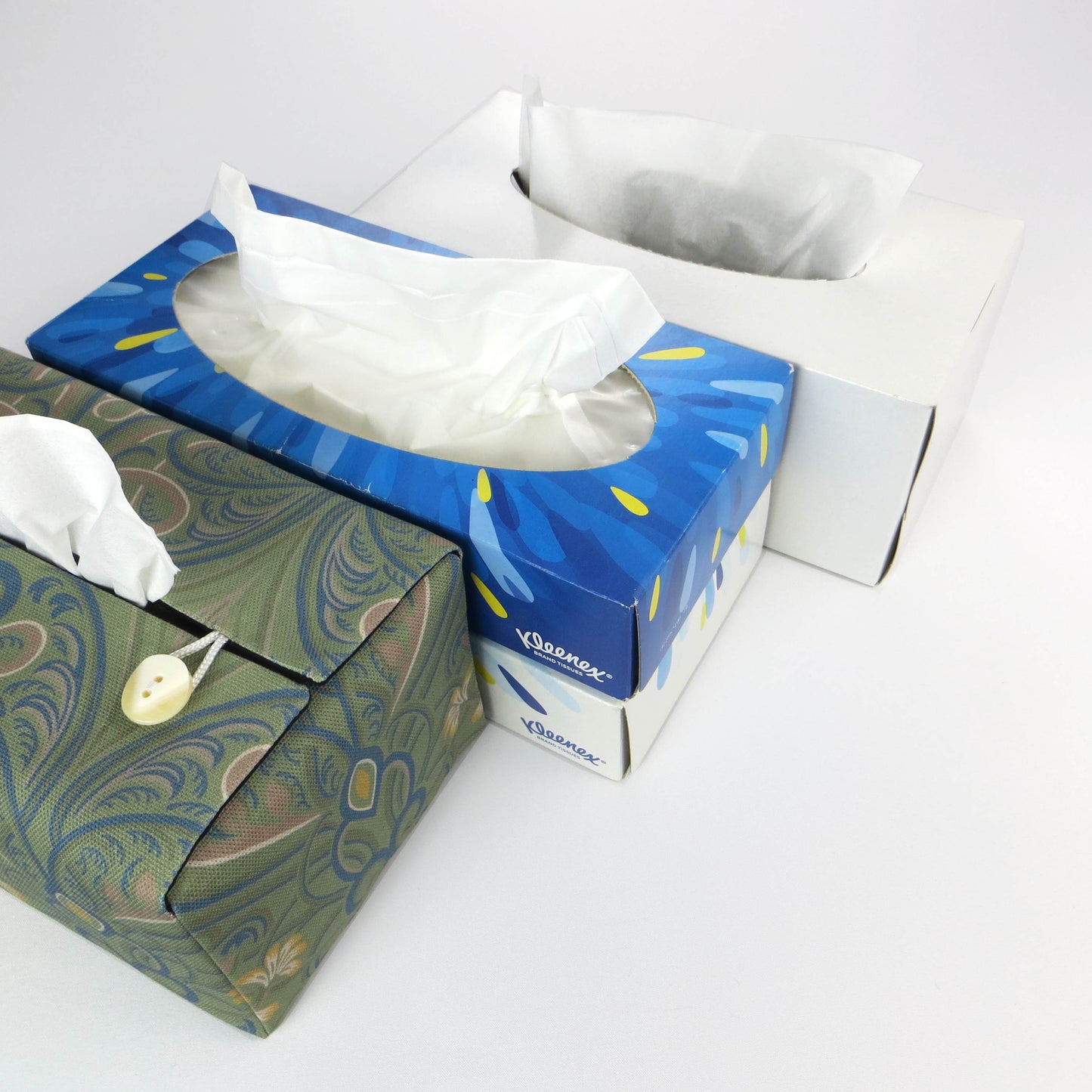 Rectangular tissue box cover with yellow flowers and blue Victorian embellishment on sage green background