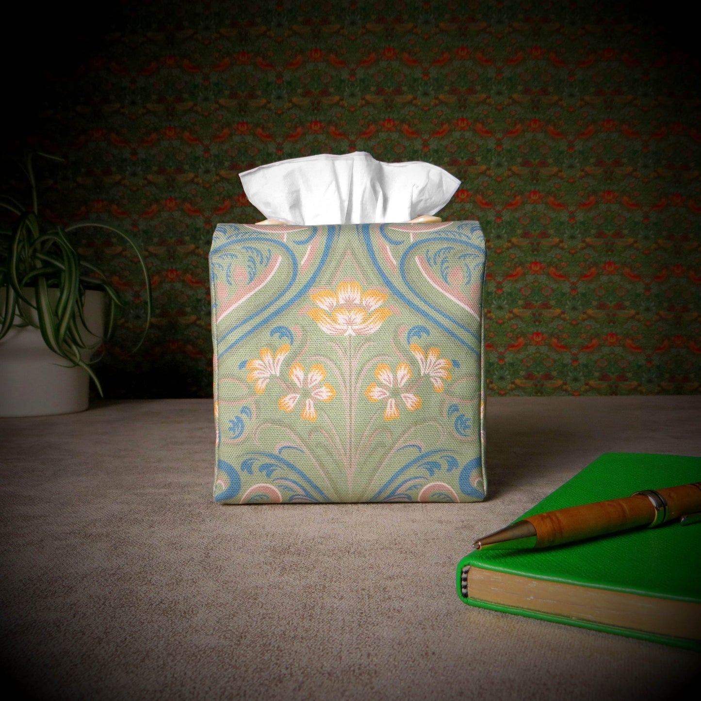 Square tissue box cover with yellow flowers and blue Victorian embellishment on sage green background