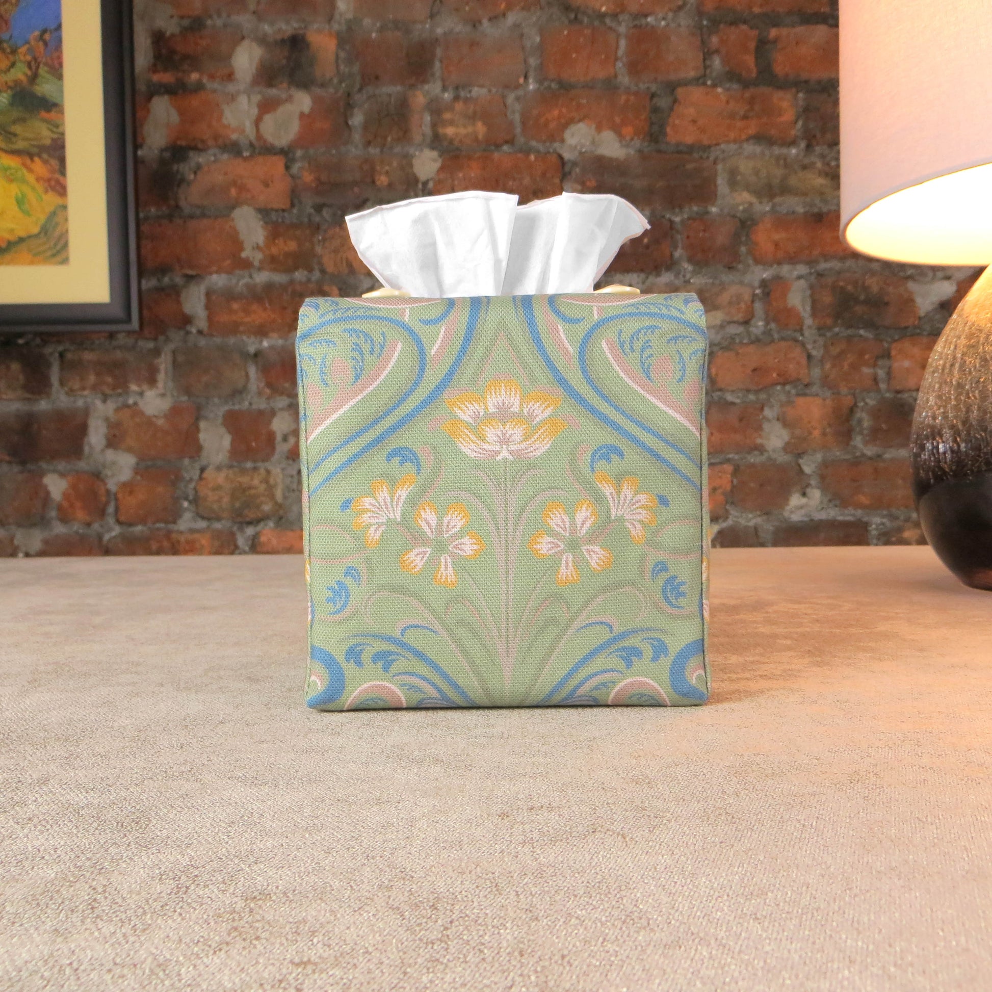 Square tissue box cover with yellow flowers and blue Victorian embellishment on sage green background