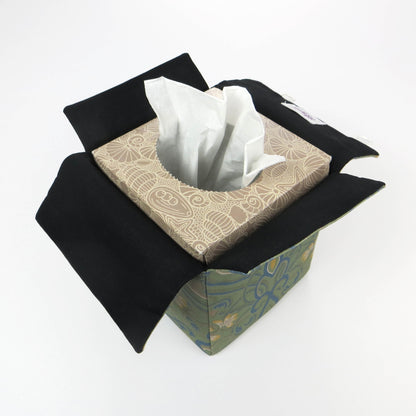 Square tissue box cover with yellow flowers and blue Victorian embellishment on sage green background