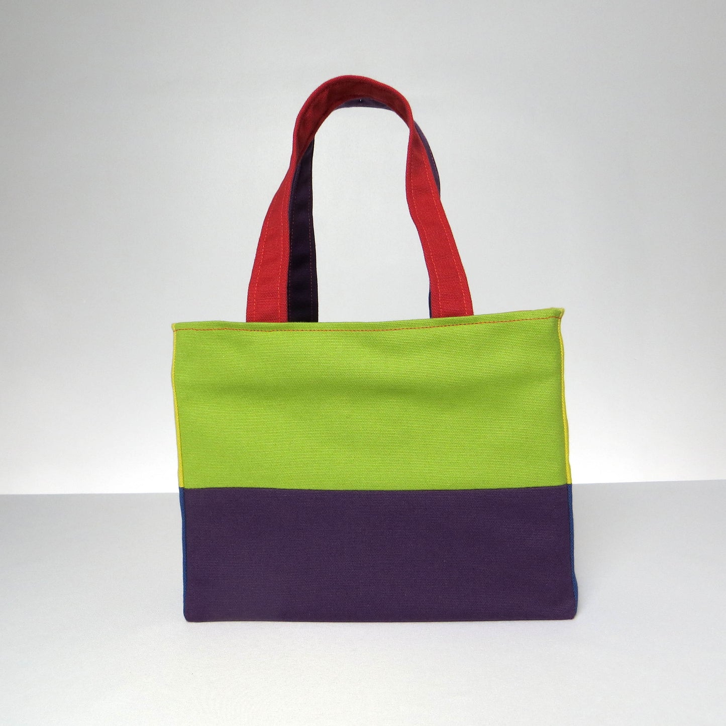 Small cotton tote bag with two vibrant colours on each side