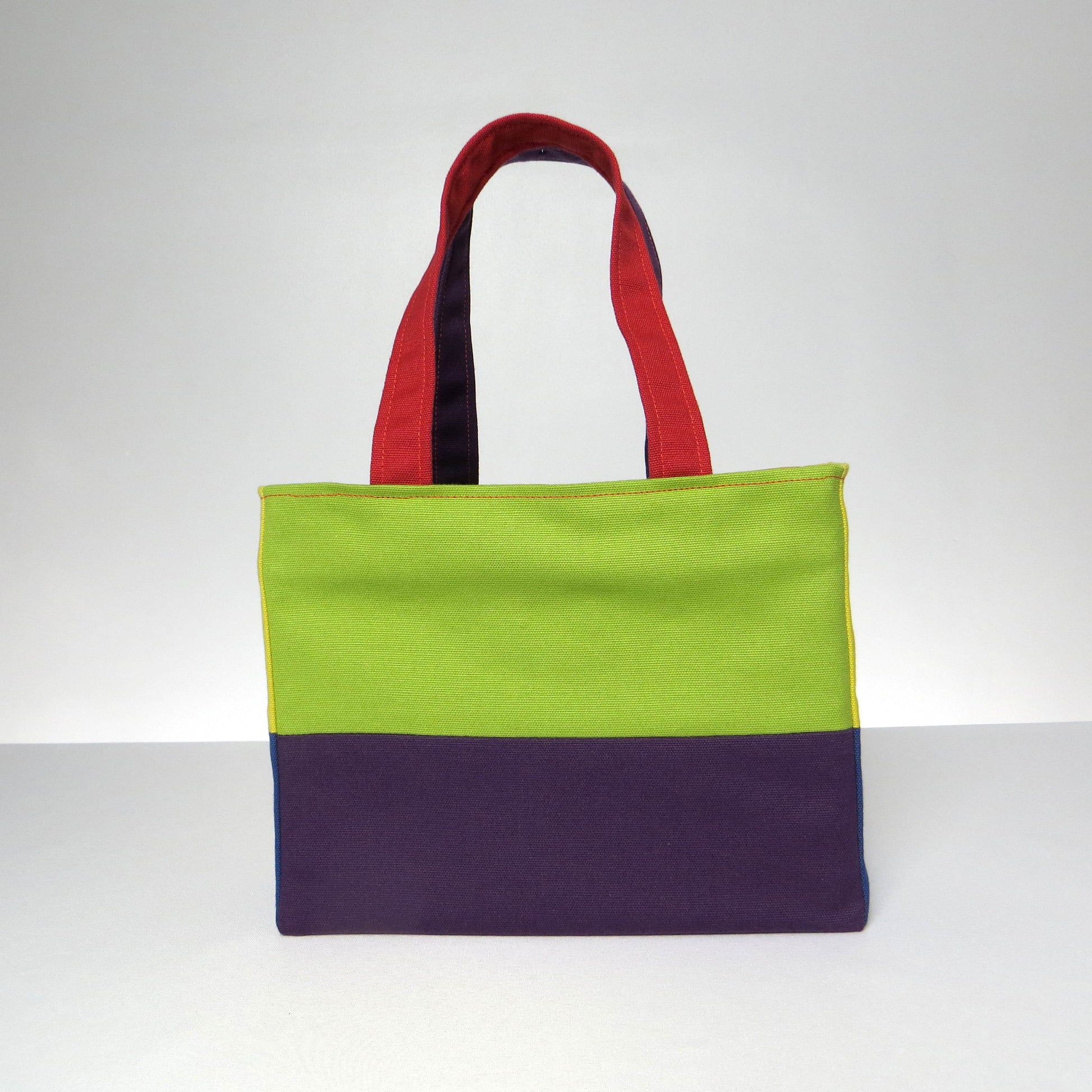 Small cotton tote bag with two vibrant colours on each side