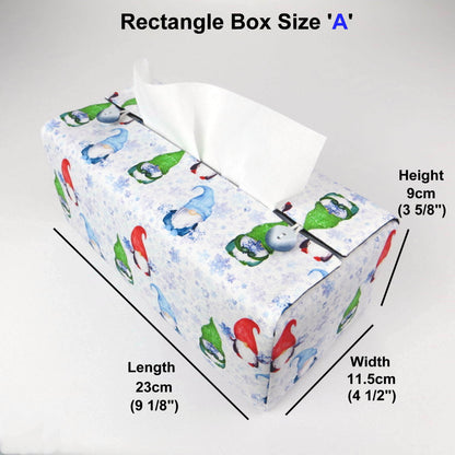 Rectangular tissue box cover with holiday themed red, green, and blue gnomes design on white and blue snowflake pattern background